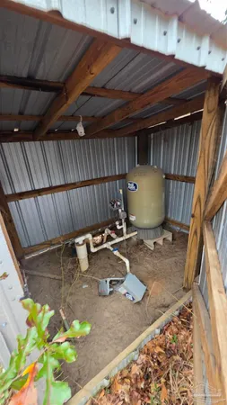 a view of a backyard with a patio