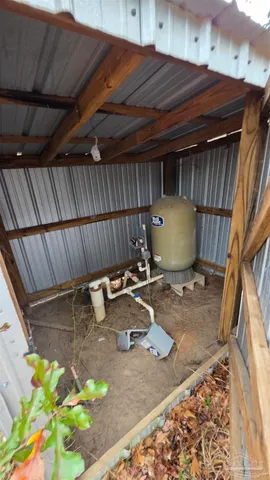 a view of a backyard with a patio