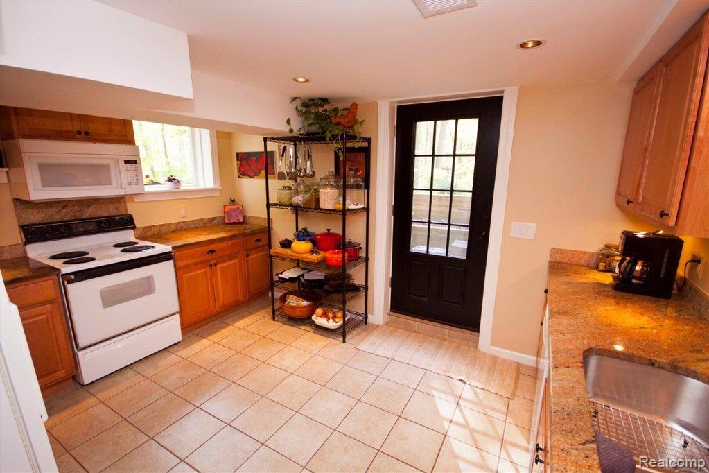 8925 Ridge Road Plymouth, MI 48170 - Photo 23 of 25 Basement Kitchen.jpg