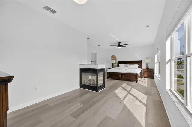 a view of a swimming pool with a lounge chair
