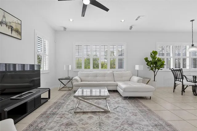 a view of a dining room with furniture window and outside view