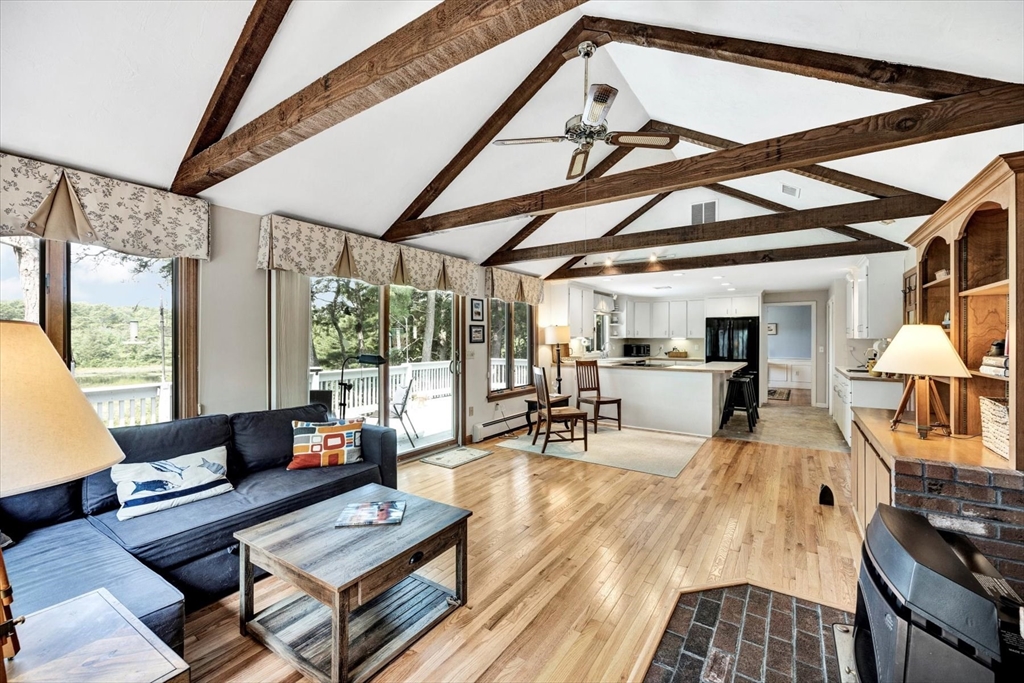 19 Babbling Brook Road Barnstable, MA 02632 - Photo 11 of 35 a living room with furniture and a flat screen tv