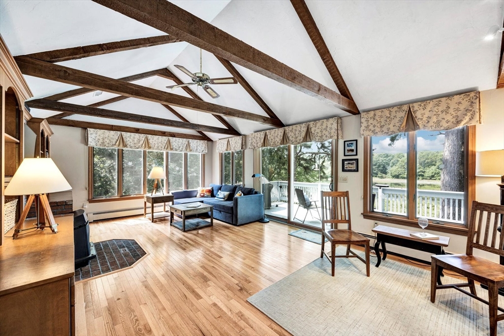 19 Babbling Brook Road Barnstable, MA 02632 - Photo 13 of 35 a living room with furniture and a large window