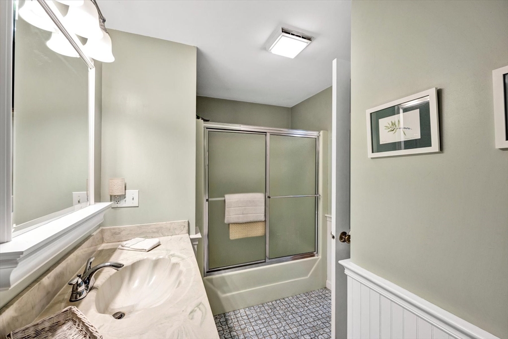 19 Babbling Brook Road Barnstable, MA 02632 - Photo 16 of 35 a bathroom with a tub and a shower
