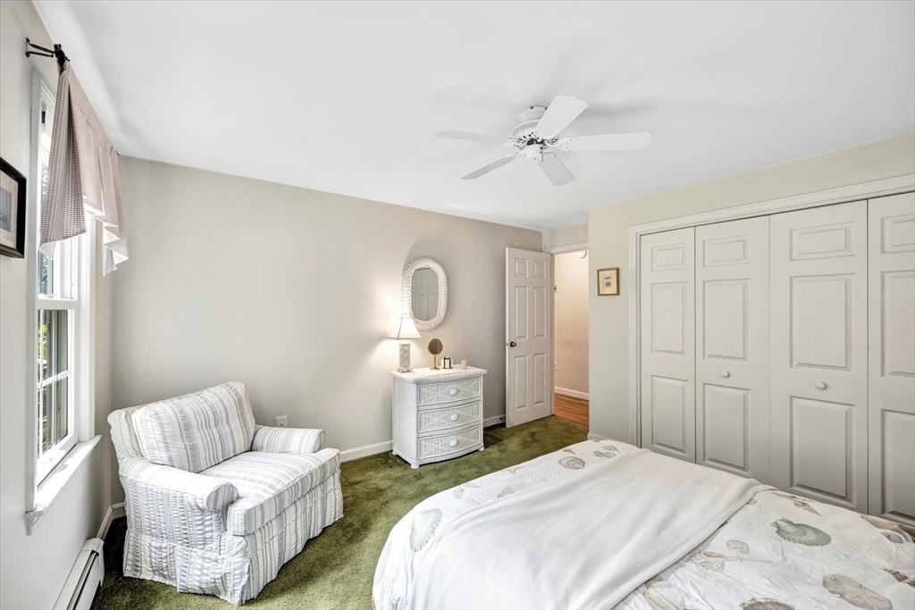 19 Babbling Brook Road Barnstable, MA 02632 - Photo 18 of 35 a bedroom with a bed and a couch