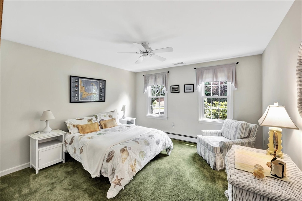 19 Babbling Brook Road Barnstable, MA 02632 - Photo 20 of 35 a bedroom with a bed and a couch