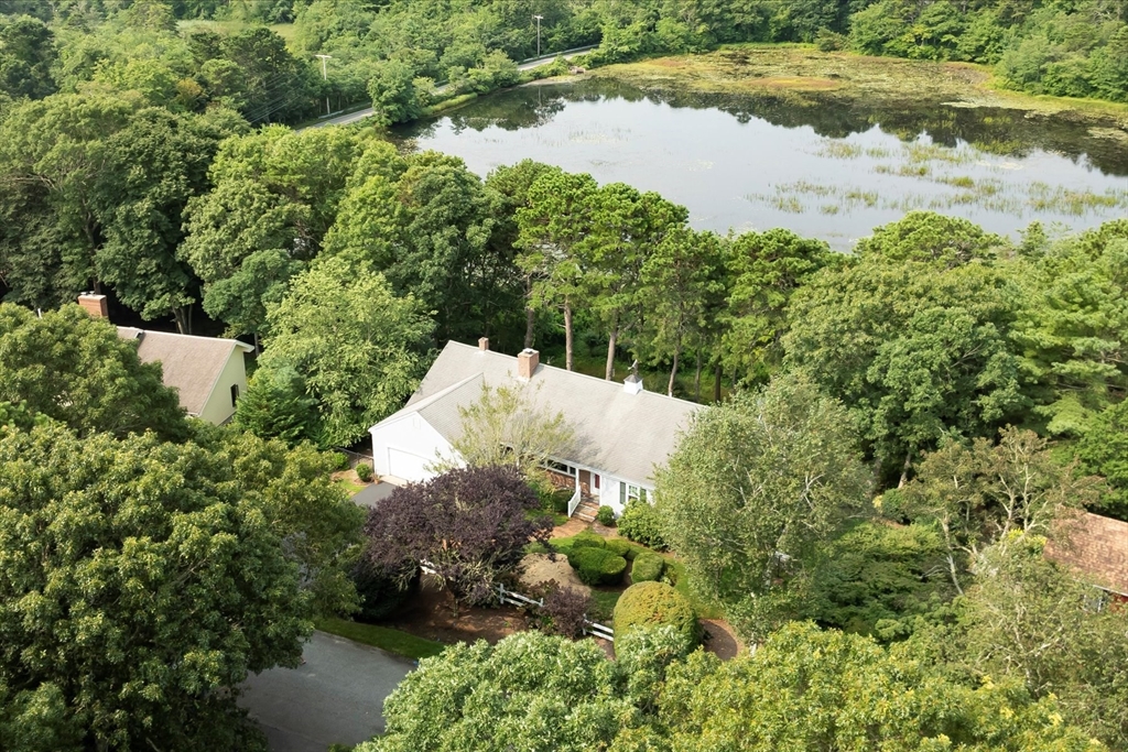 19 Babbling Brook Road Barnstable, MA 02632 - Photo 2 of 35 a view of a lake with beach and lake view