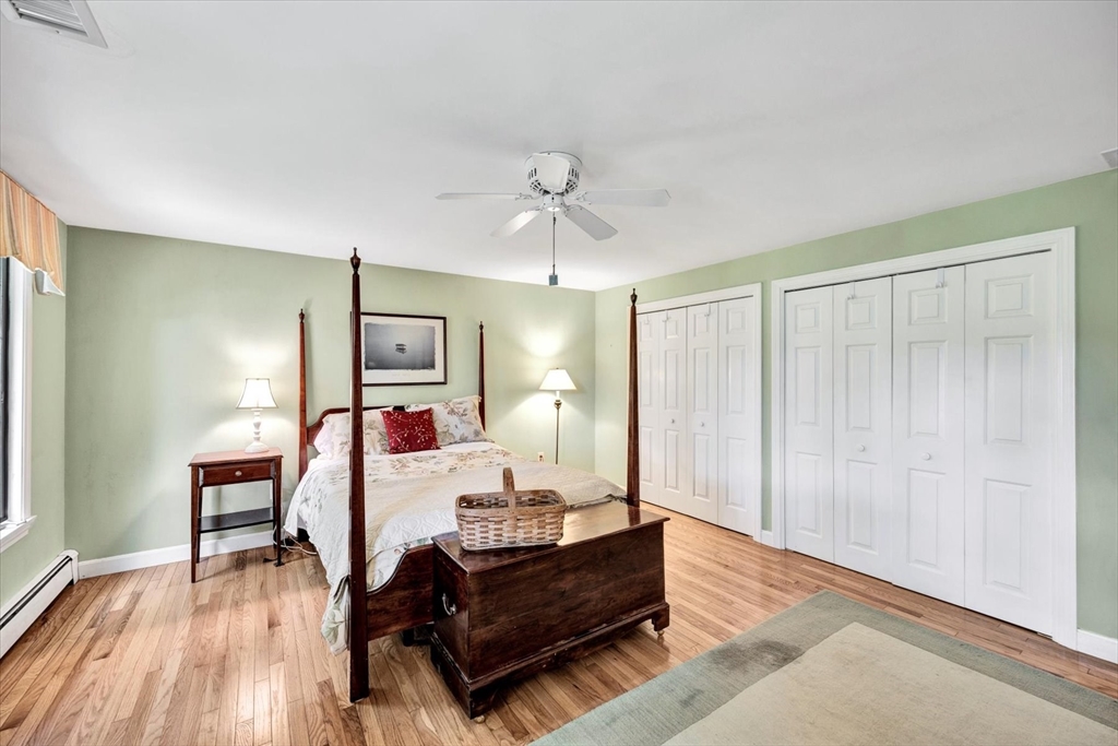 19 Babbling Brook Road Barnstable, MA 02632 - Photo 22 of 35 a living room with furniture and a wooden floor