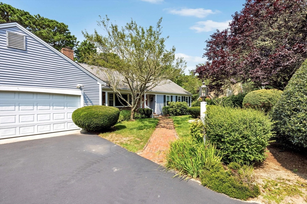 19 Babbling Brook Road Barnstable, MA 02632 - Photo 34 of 35 front view of a house with a yard