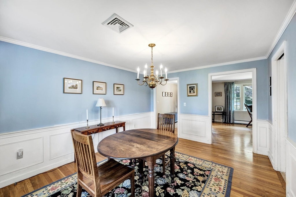 19 Babbling Brook Road Barnstable, MA 02632 - Photo 6 of 35 a view of a dining room with furniture and wooden floor