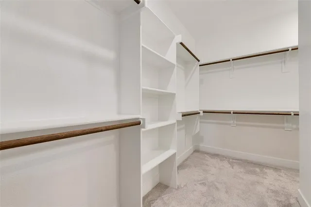 a view of an empty walk in closet
