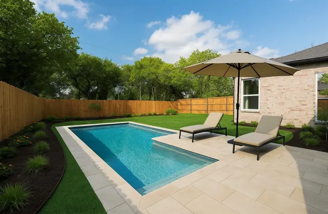 a view of a backyard with a patio