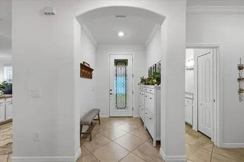 a kitchen with a sink stove and refrigerator