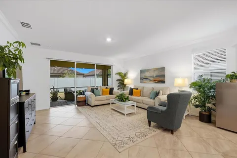 a living room with furniture and a table