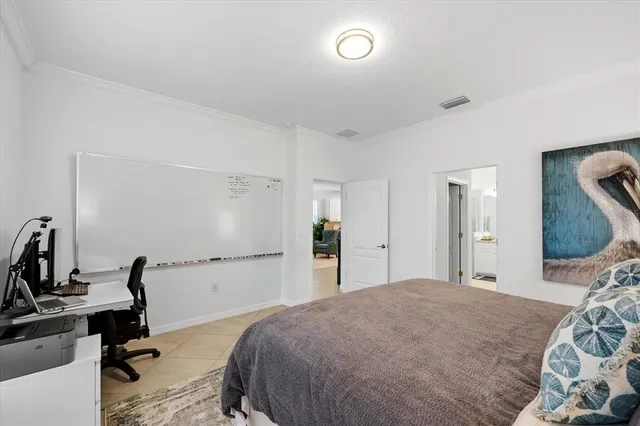 a spacious bathroom with a granite countertop sink a toilet and a mirror