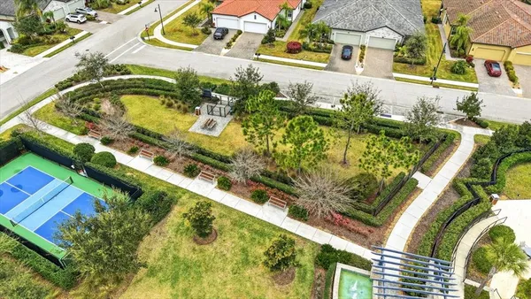 a view of a swimming pool with a yard