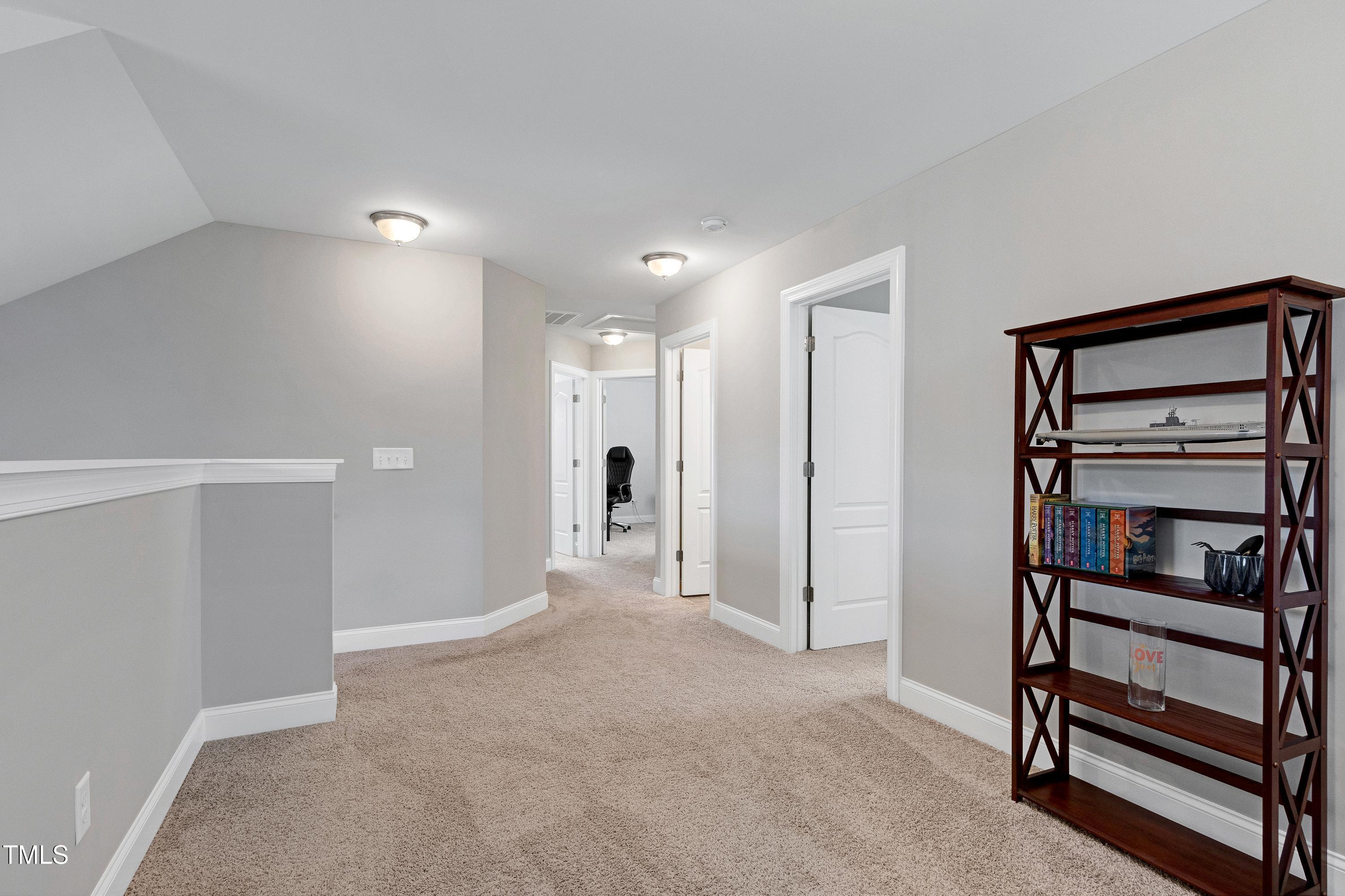 1613 Osprey Ridge Drive Willow Spring, NC 27592 - Photo 20 of 37 a view of empty room with shelves