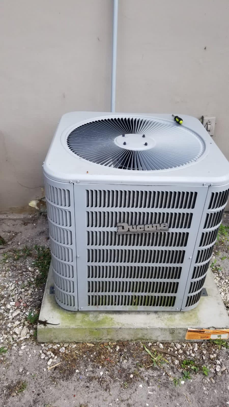 4115 Riverside Drive, Unit 15 Coral Springs, FL 33065 - Photo 25 of 33 a outdoor view of a brick house with a wooden fence