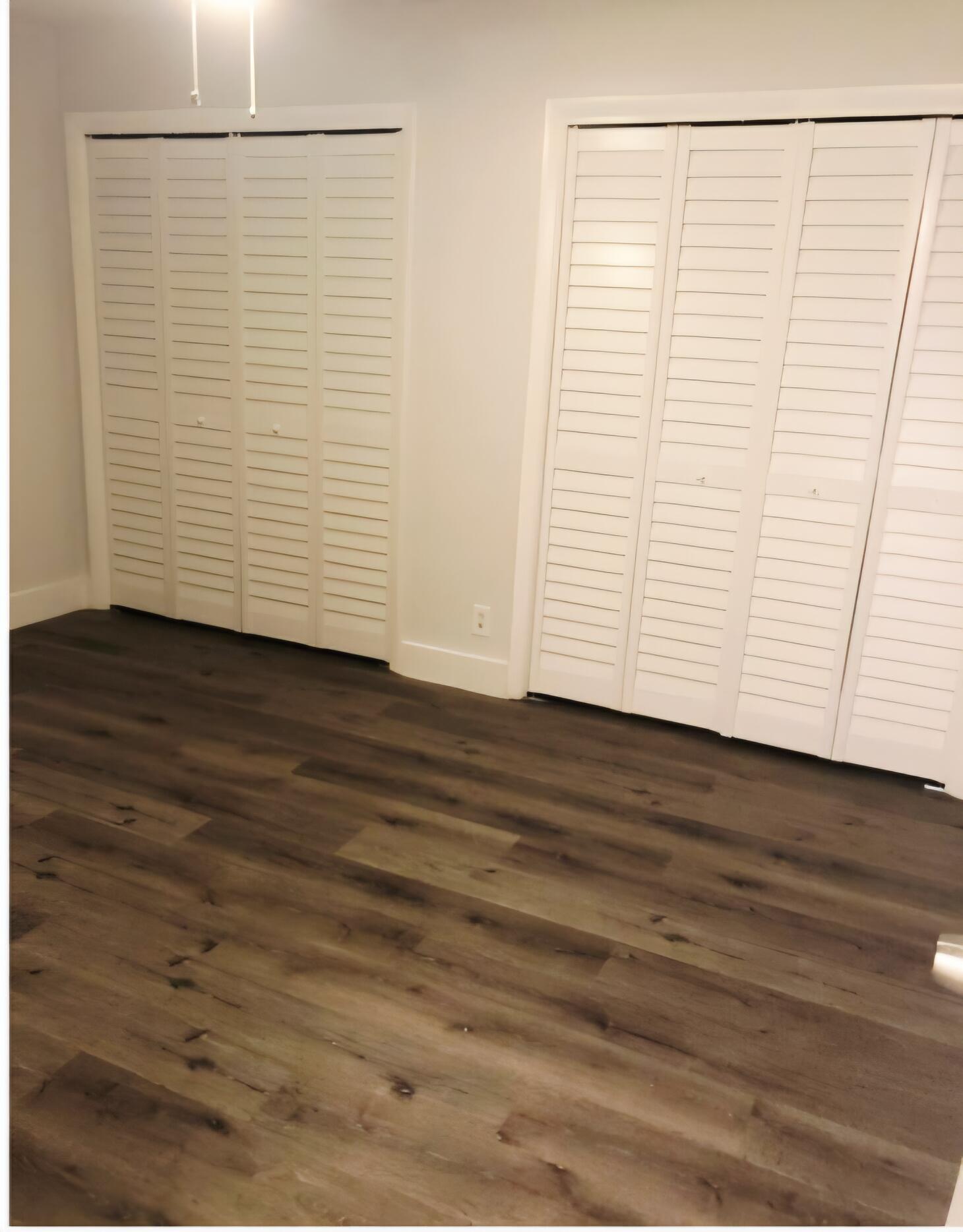 4115 Riverside Drive, Unit 15 Coral Springs, FL 33065 - Photo 4 of 33 a view of a room with wooden floor