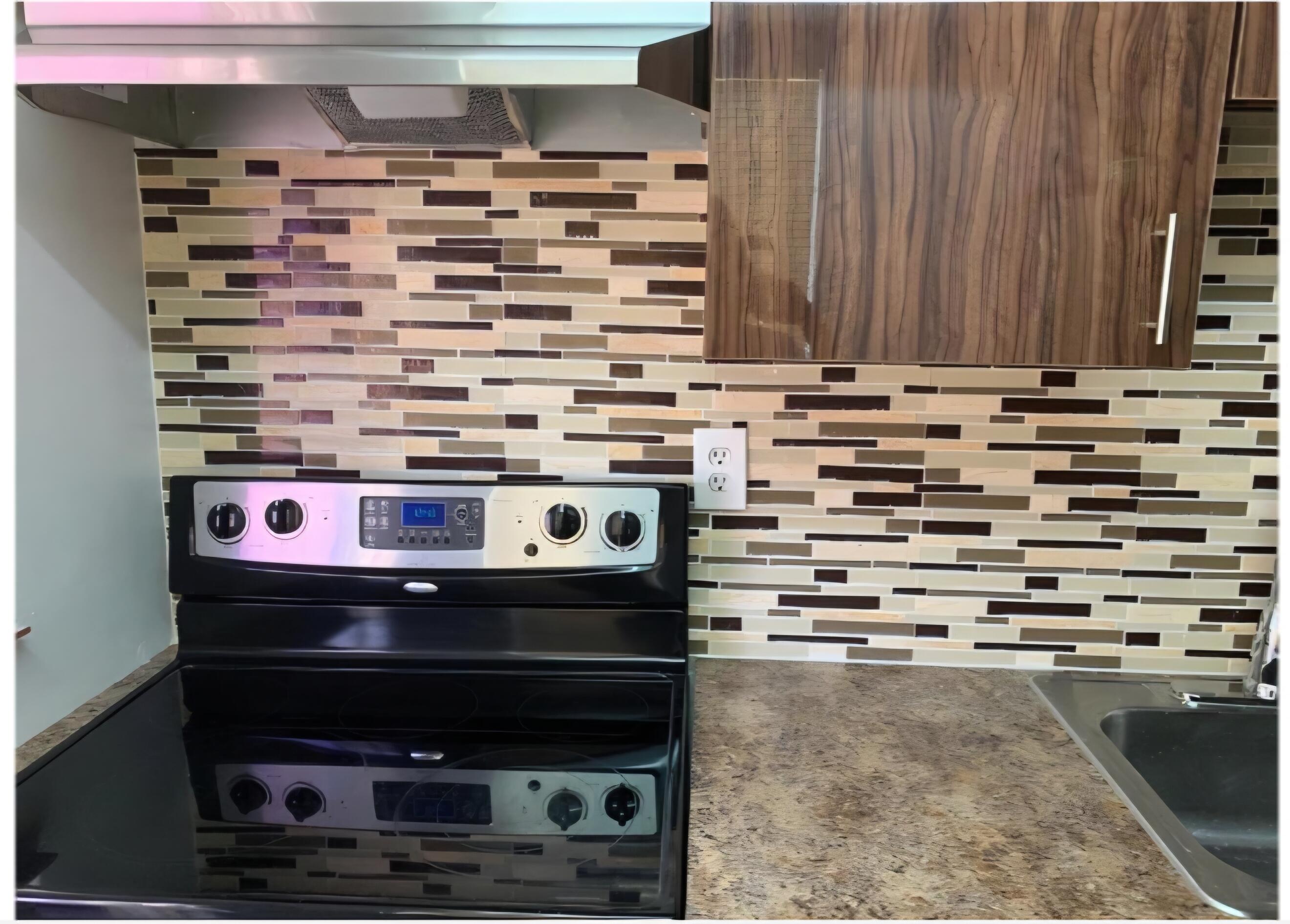 4115 Riverside Drive, Unit 15 Coral Springs, FL 33065 - Photo 7 of 33 a close view of stove top oven