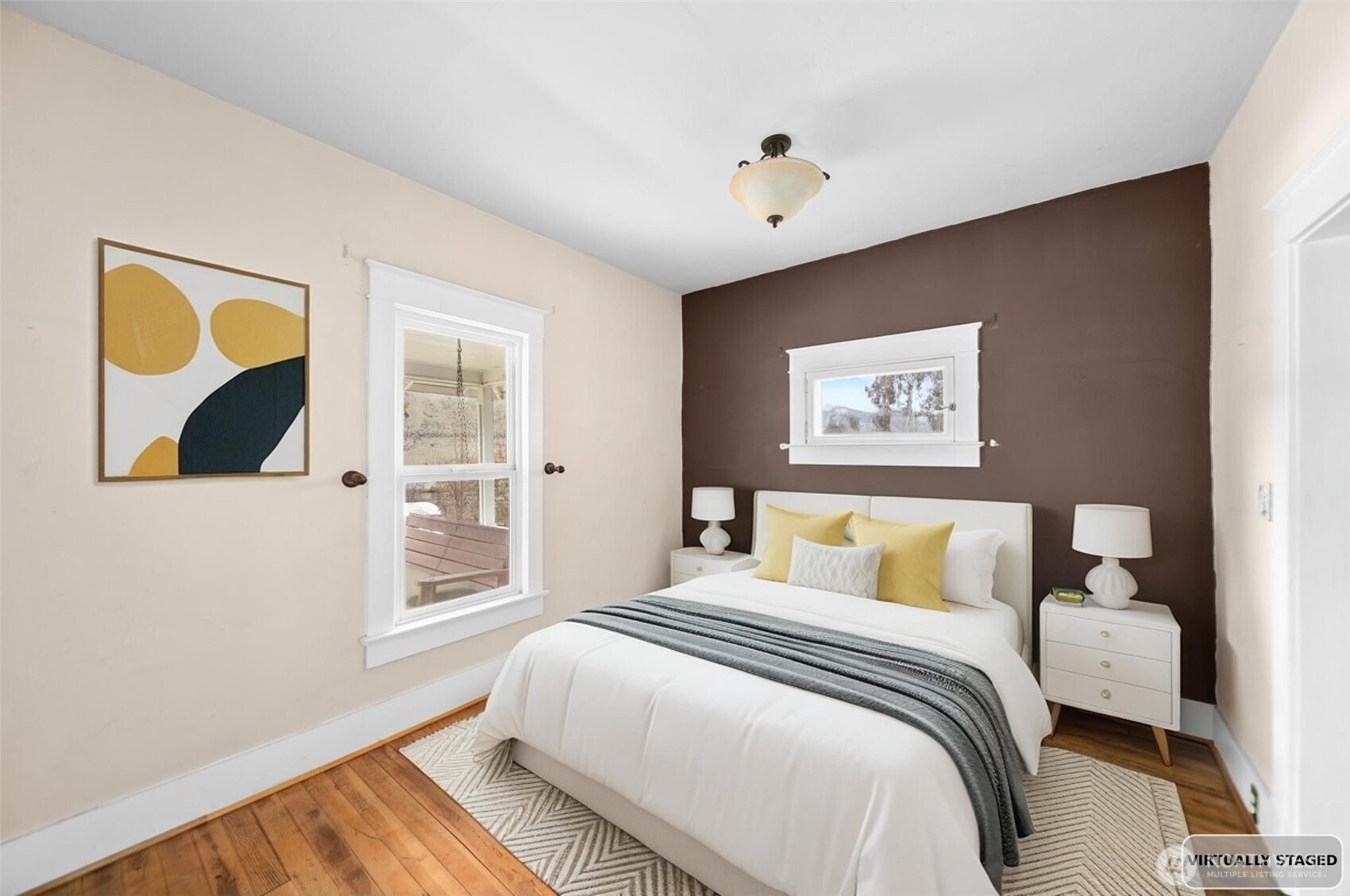 4693 Valley Street Monitor, WA 98836 - Photo 11 of 40 a bedroom with a bed and a painting on the wall