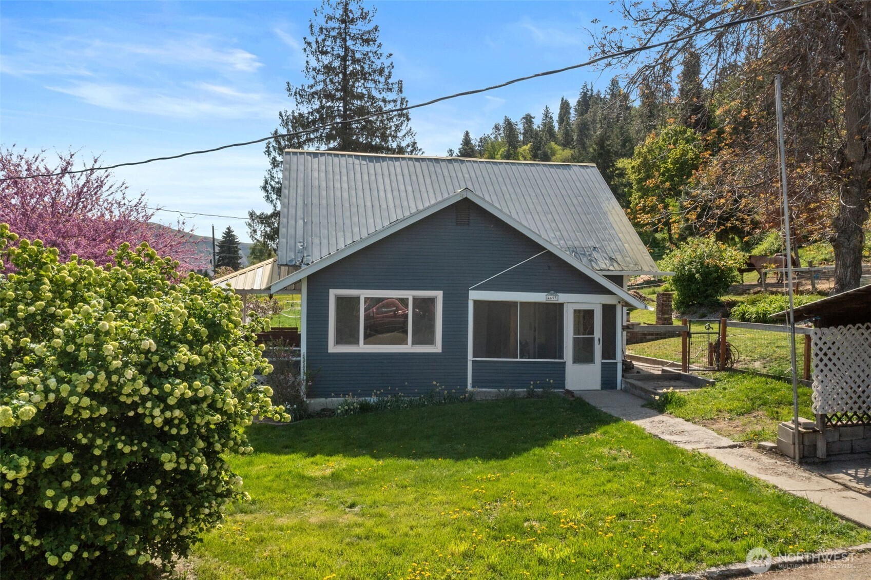 4693 Valley Street Monitor, WA 98836 - Photo 2 of 40 a front view of house with yard and green space