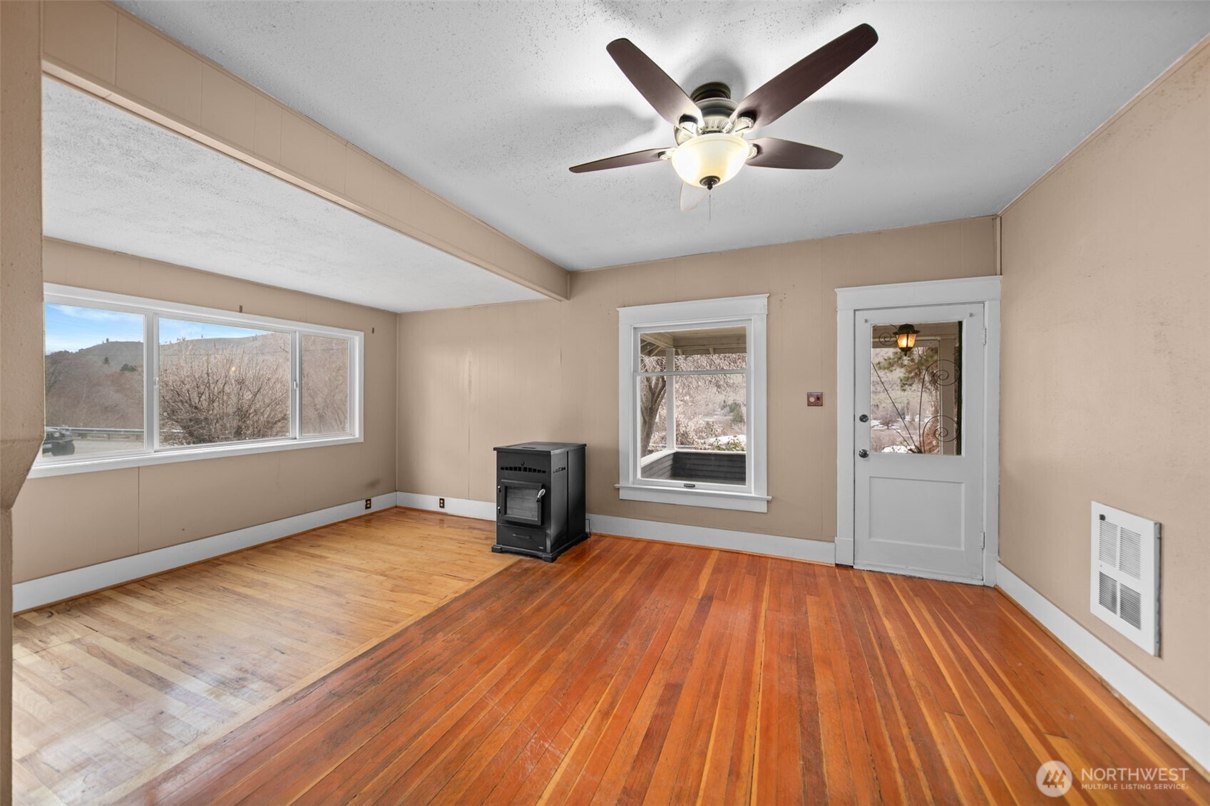 4693 Valley Street Monitor, WA 98836 - Photo 5 of 40 wooden floor in an empty room with a window