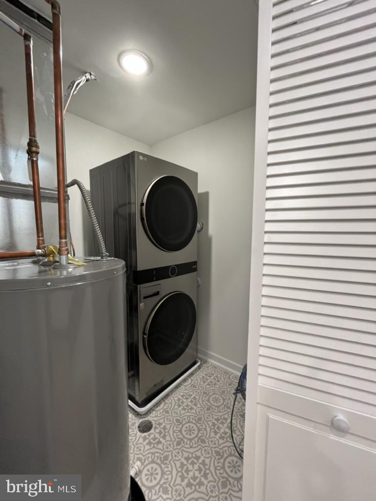 2117 North 8th Street Philadelphia, PA 19122 - Photo 12 of 17 a utility room with dryer and washer