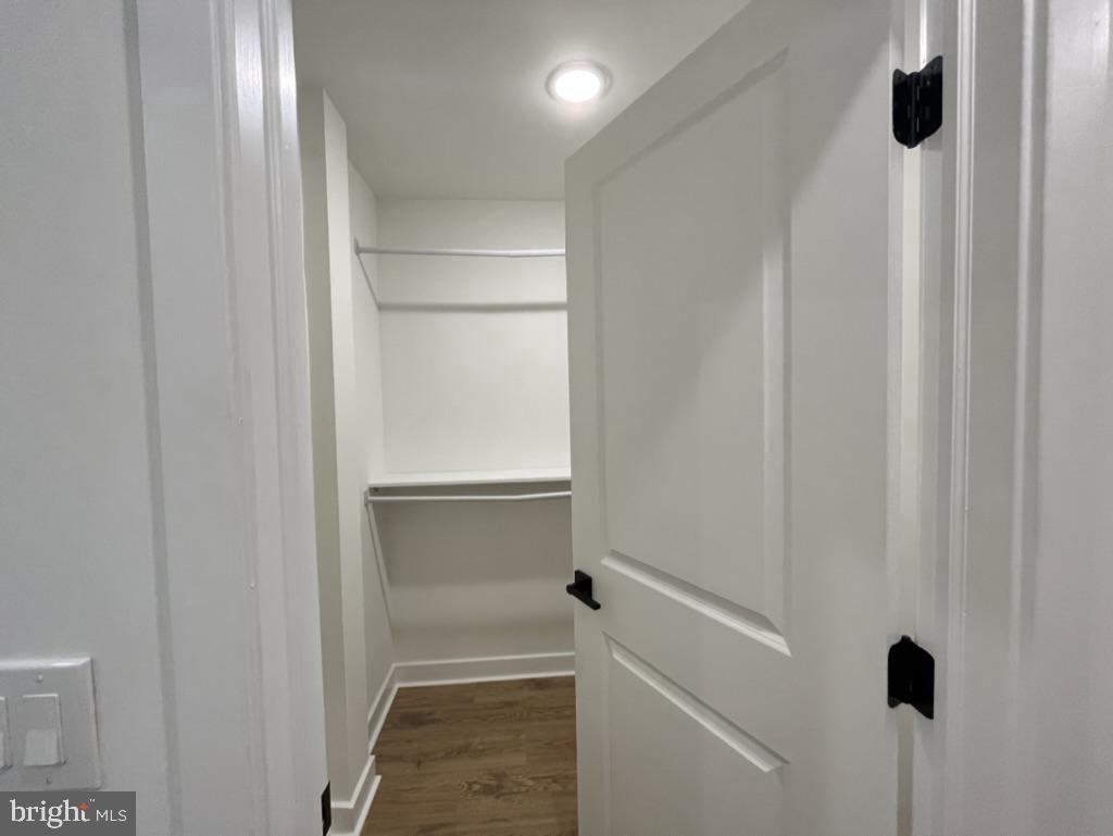 2117 North 8th Street Philadelphia, PA 19122 - Photo 15 of 17 a view of walk in closet with empty racks
