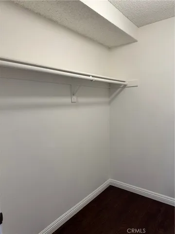 a view of an empty walk in closet