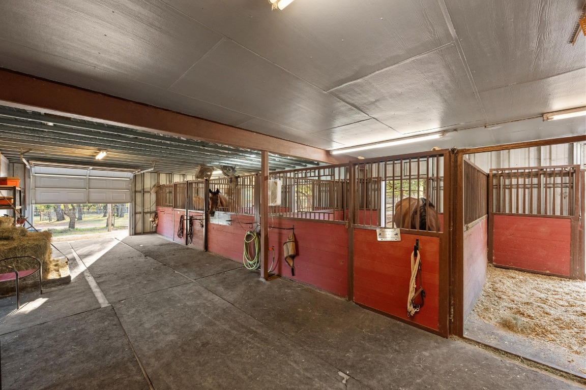 5200 Bell Springs Road Dripping Springs, TX 78620 - Photo 13 of 36 a view of an empty room with a balcony