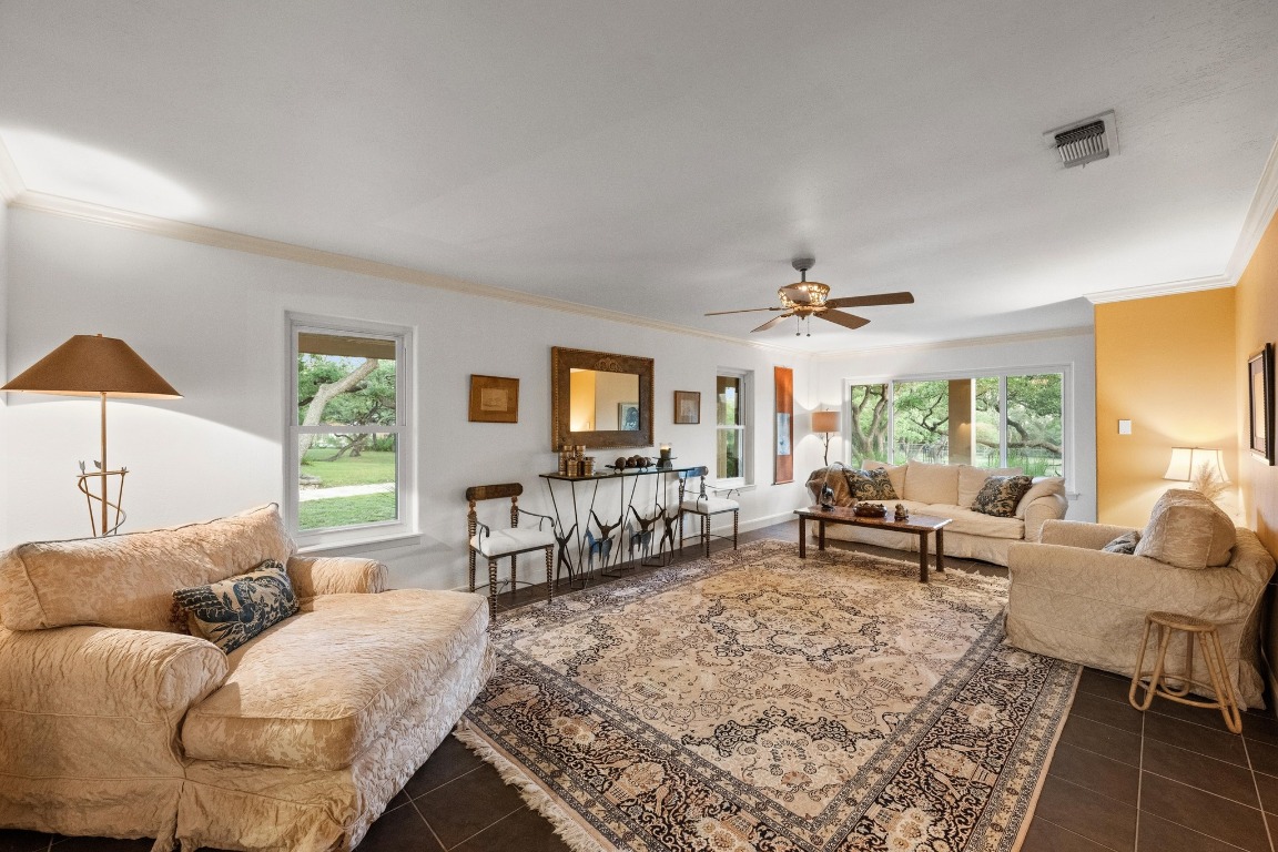 5200 Bell Springs Road Dripping Springs, TX 78620 - Photo 20 of 36 a living room with furniture and a large window