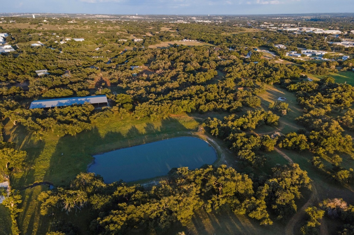 5200 Bell Springs Road Dripping Springs, TX 78620 - Photo 3 of 36 an aerial view of residential houses with outdoor space
