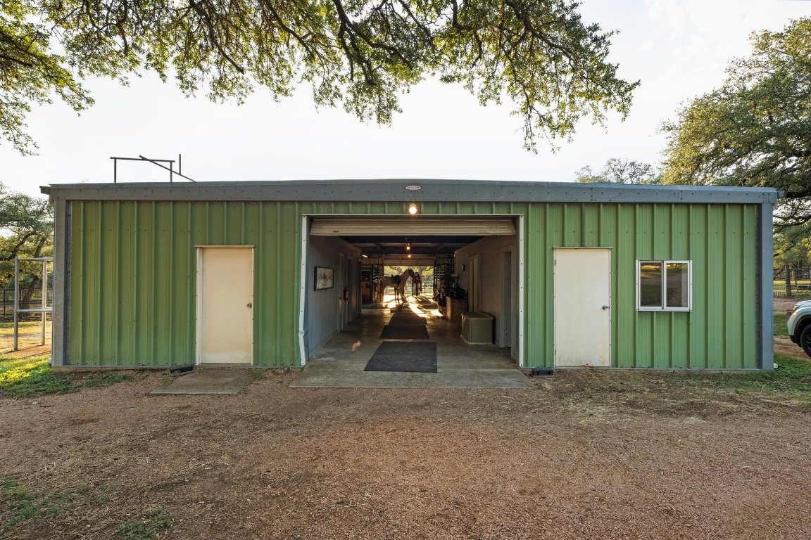 5200 Bell Springs Road Dripping Springs, TX 78620 - Photo 10 of 36 a view of a house with backyard and deck