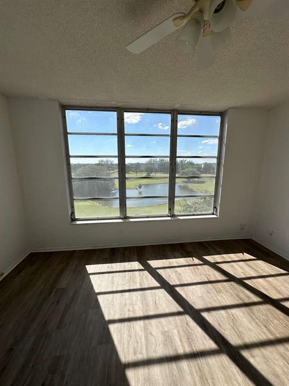 2681 South Course Drive, Unit 612 Pompano Beach, FL 33069 - Photo 17 of 27 a view of an empty room with a window