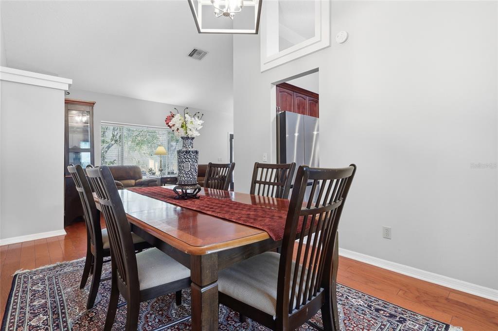 3488 Ridge Boulevard Palm Harbor, FL 34684 - Photo 13 of 30 a view of a dining room with furniture