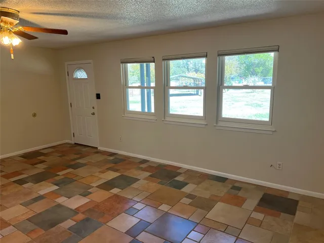 a view of a room with a window