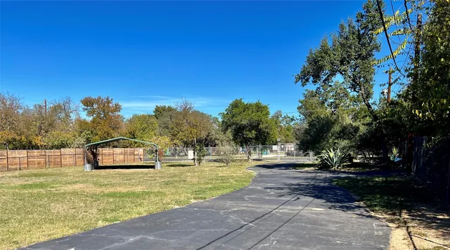 a view of bathroom with a black gate