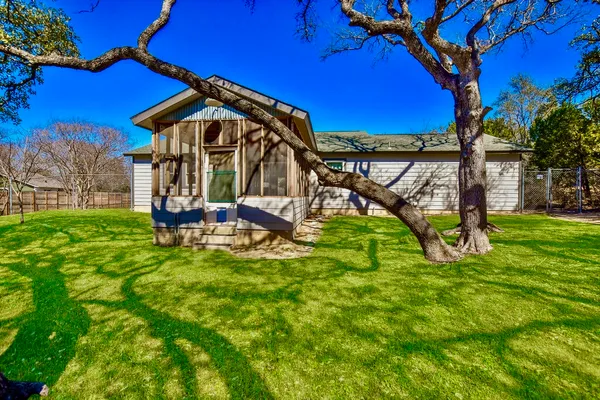 a house with swimming pool in front of it