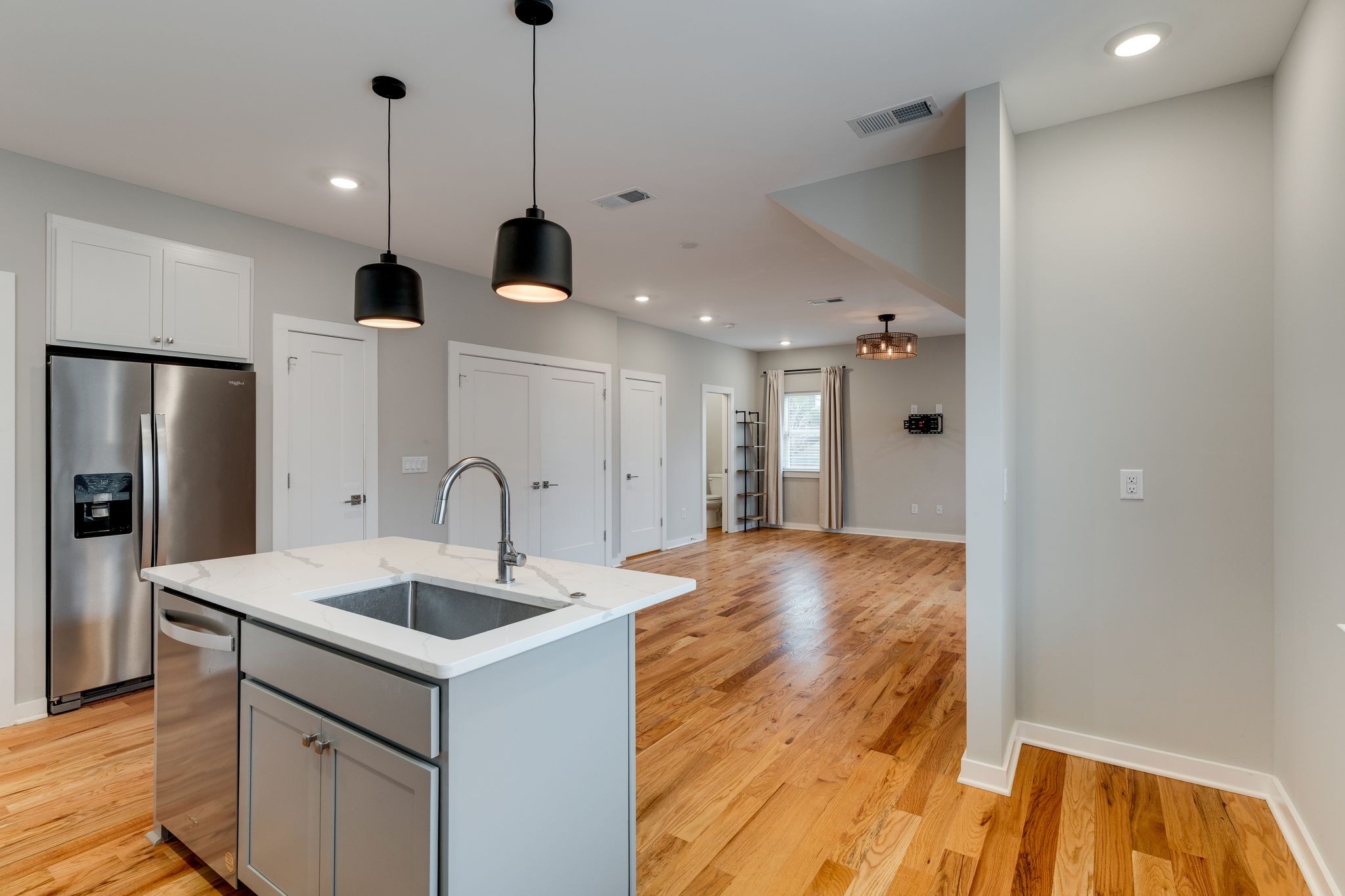 109 A Duke Street Nashville, TN 37207 - Photo 10 of 26 a kitchen with stainless steel appliances granite countertop a sink a refrigerator and a stove