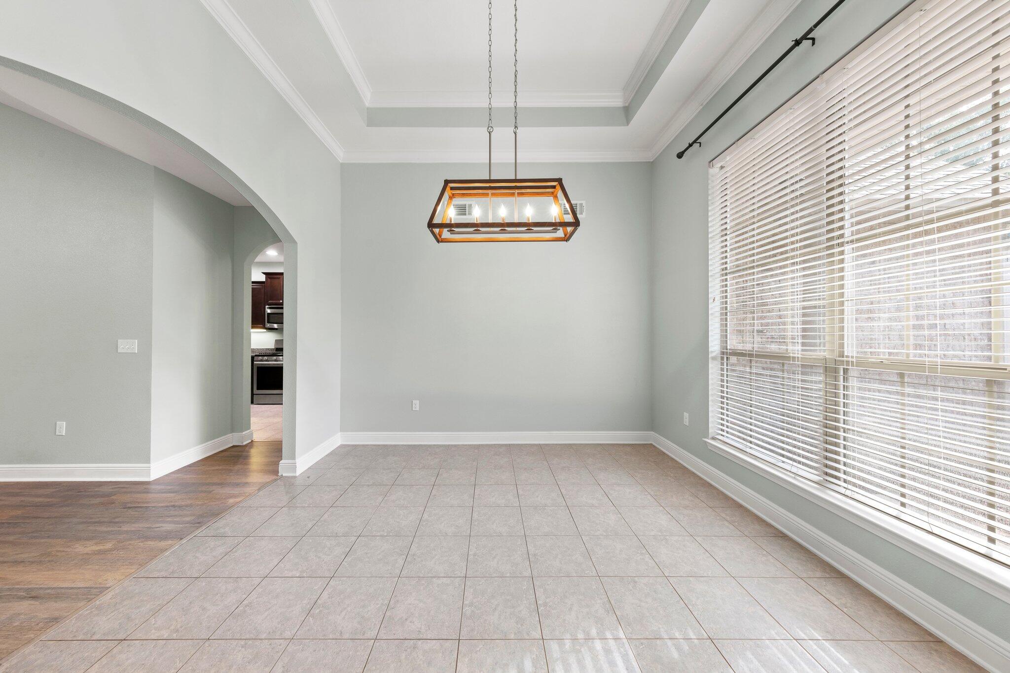 208 Foxchase Way Crestview, FL 32536 - Photo 11 of 51 a view of an empty room with a window