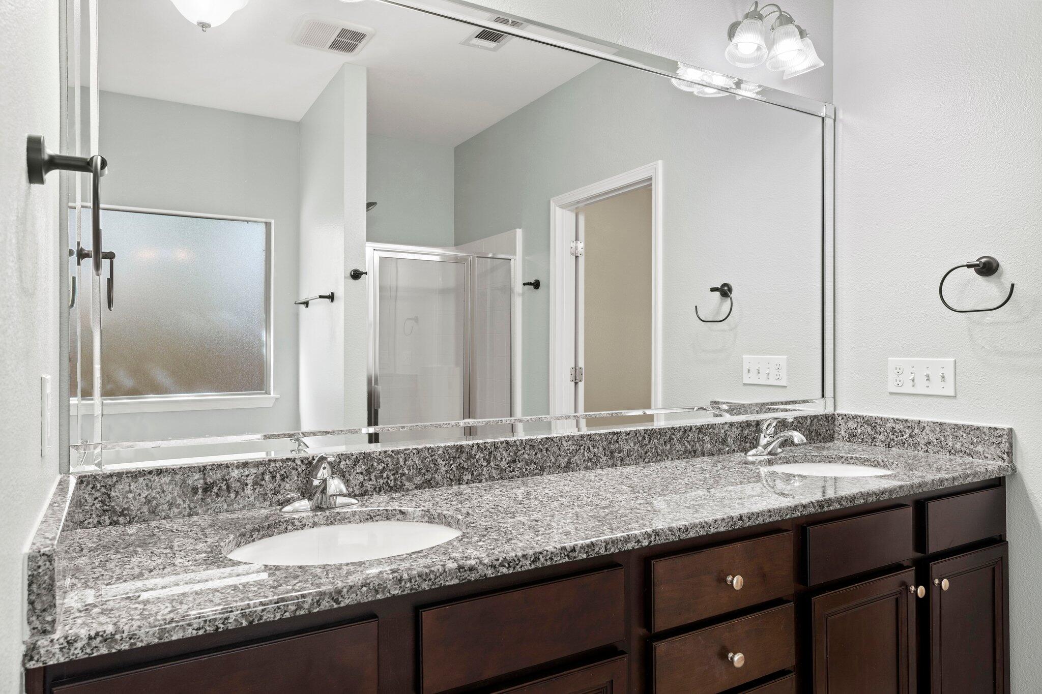 208 Foxchase Way Crestview, FL 32536 - Photo 28 of 51 a bathroom with a granite countertop sink and a mirror