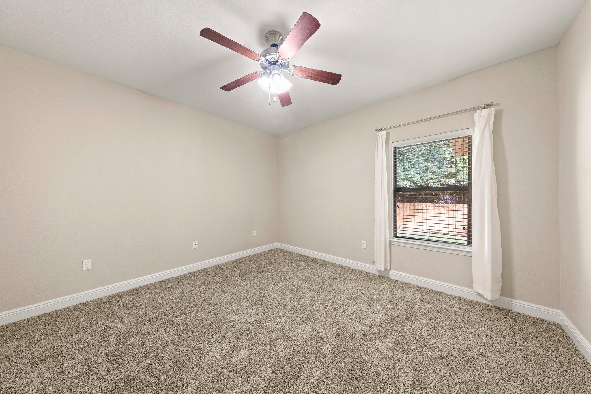 208 Foxchase Way Crestview, FL 32536 - Photo 34 of 51 an empty room with a window