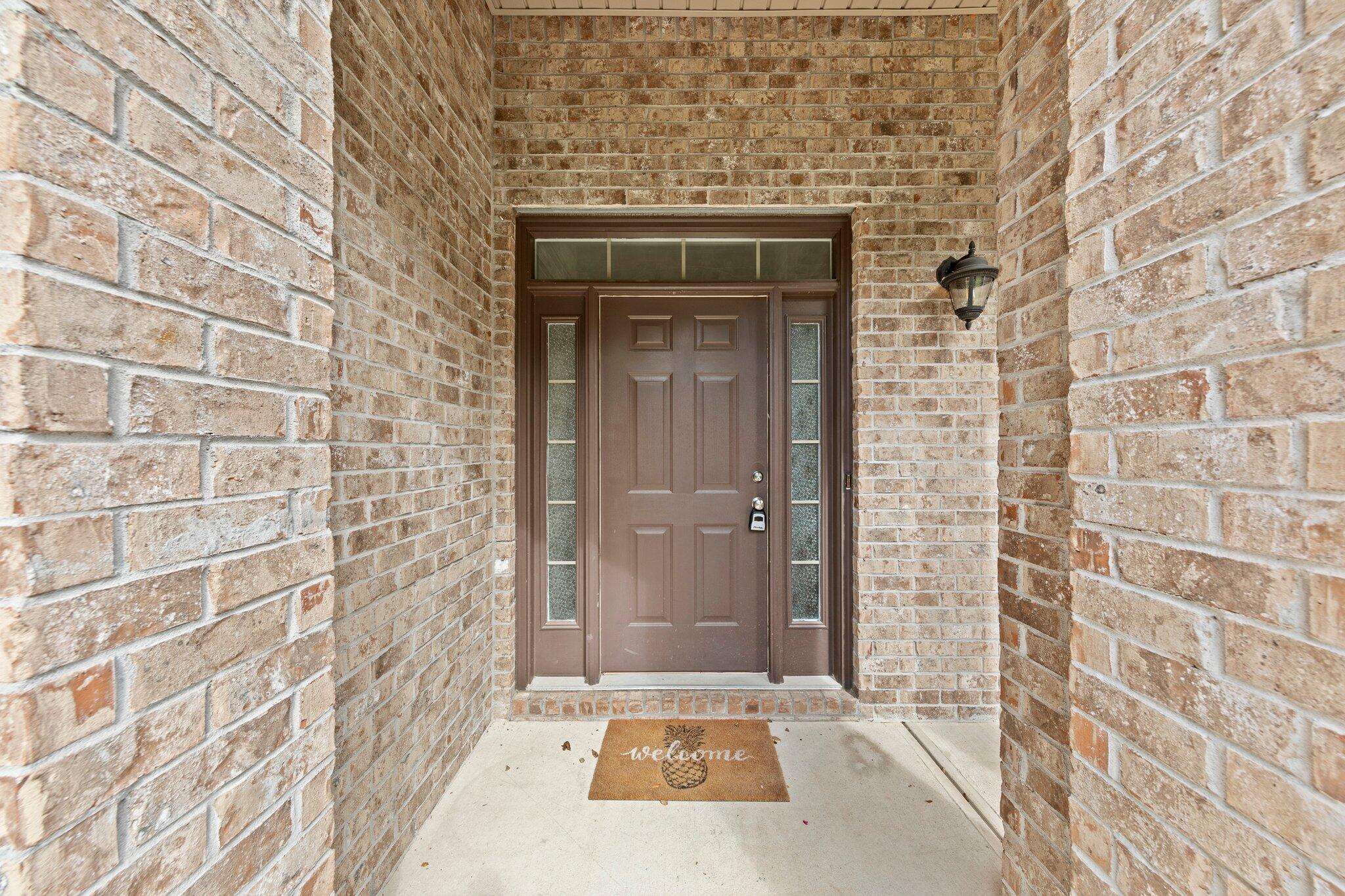 208 Foxchase Way Crestview, FL 32536 - Photo 5 of 51 view of a brick house