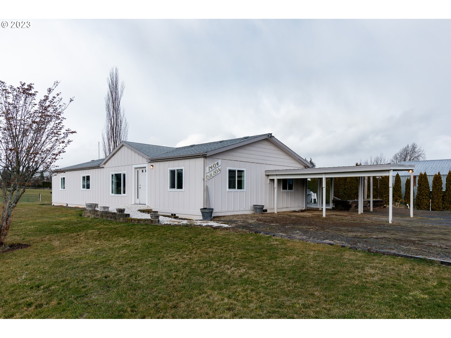 1404 Dillon Road Hood River, OR 97031 - Photo 1 of 30 a house view with a garden space