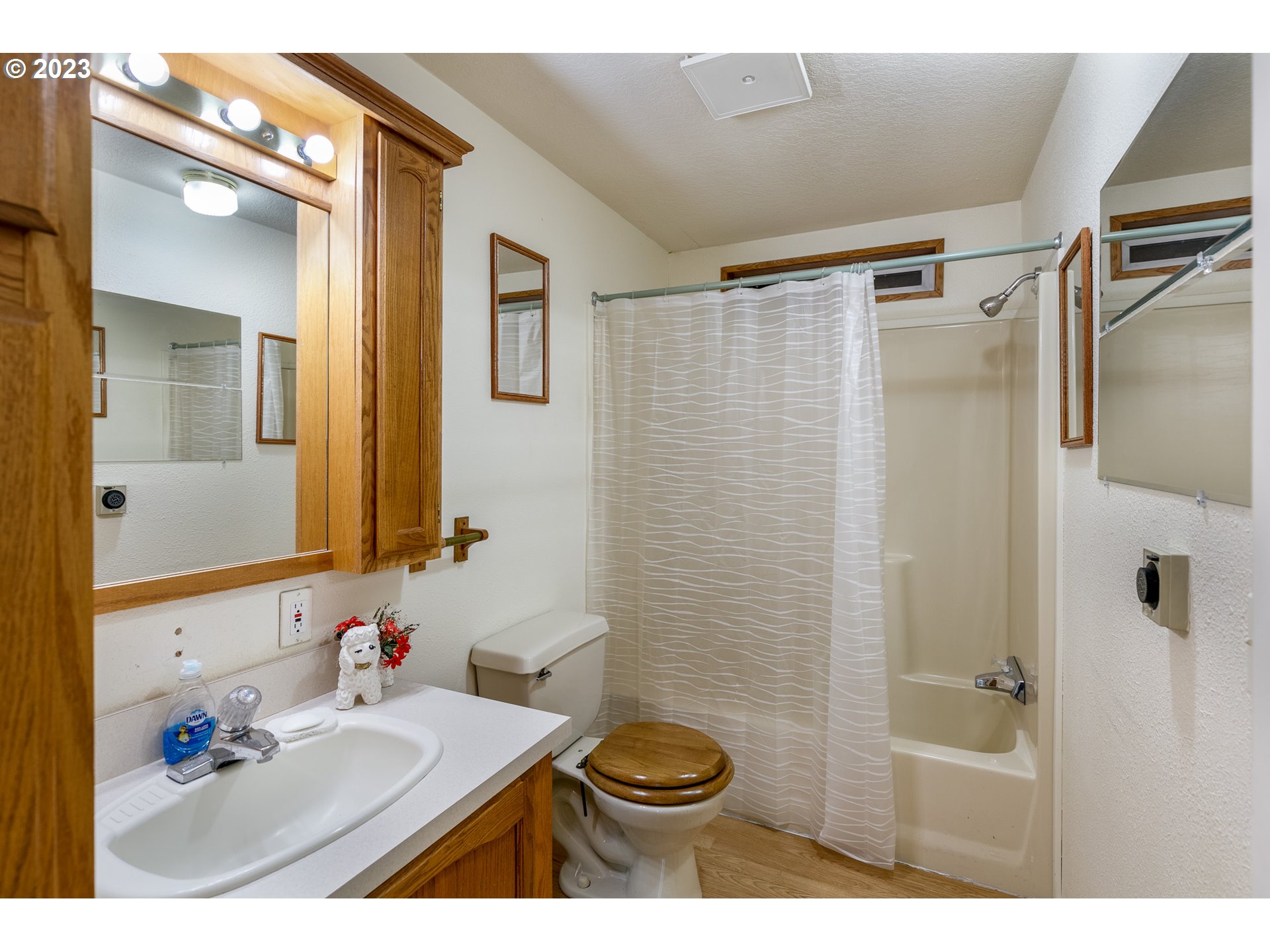 1404 Dillon Road Hood River, OR 97031 - Photo 15 of 30 a bathroom with a sink toilet and shower