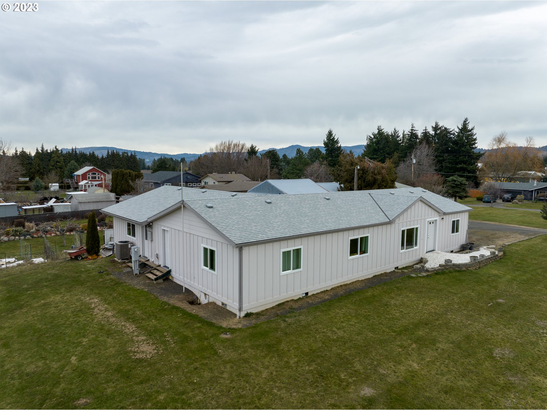 1404 Dillon Road Hood River, OR 97031 - Photo 29 of 30 a aerial view of residential houses with outdoor space and trees