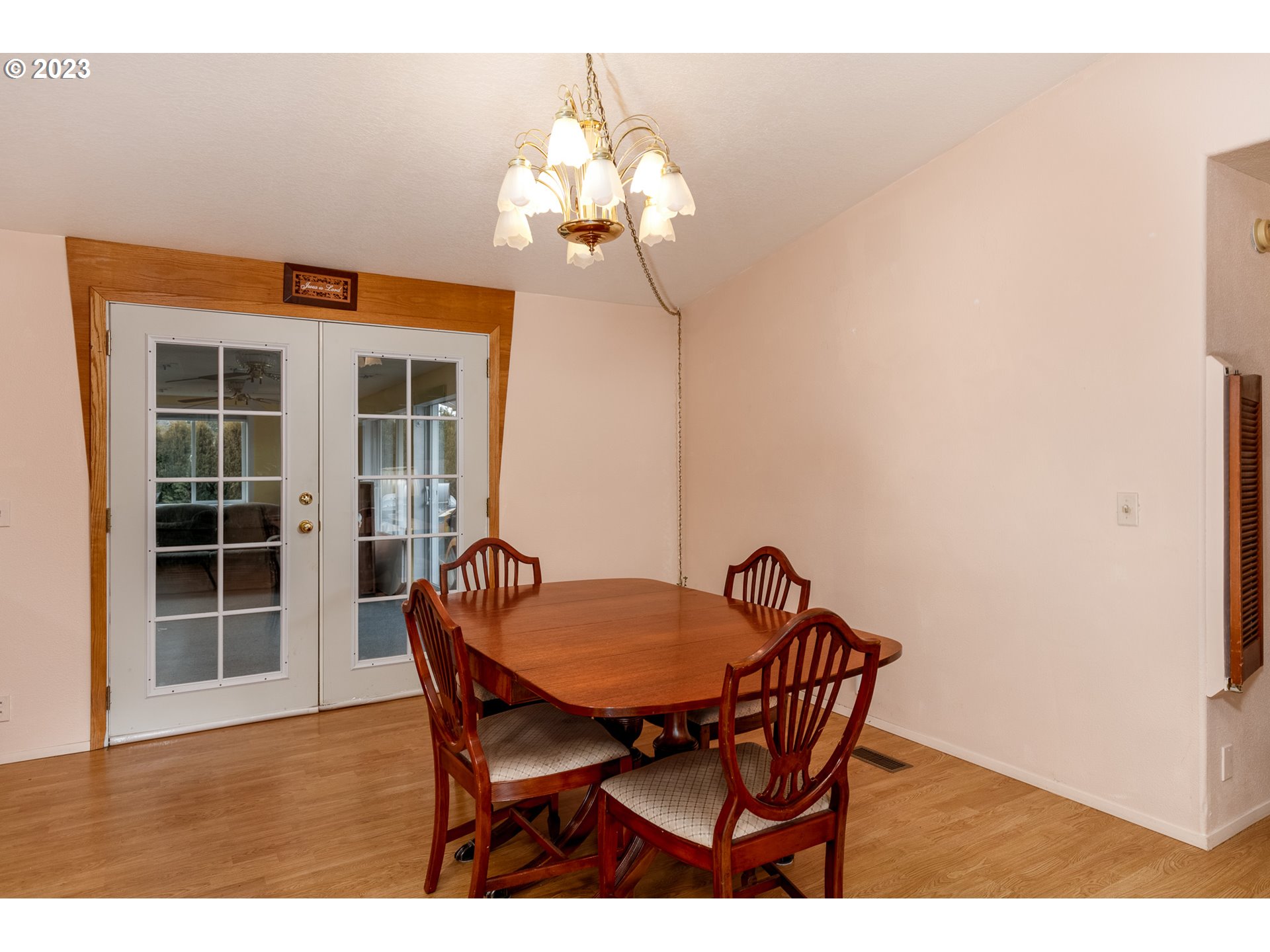1404 Dillon Road Hood River, OR 97031 - Photo 8 of 30 a view of a dining room with furniture and wooden floor