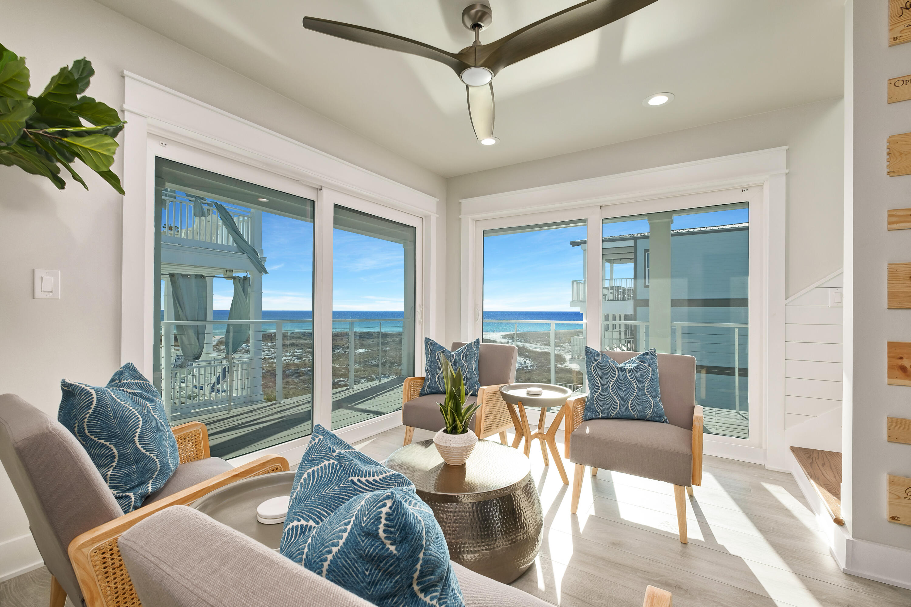 76 Hotz Avenue Santa Rosa Beach, FL 32459 - Photo 26 of 71 a living room with furniture and a floor to ceiling window