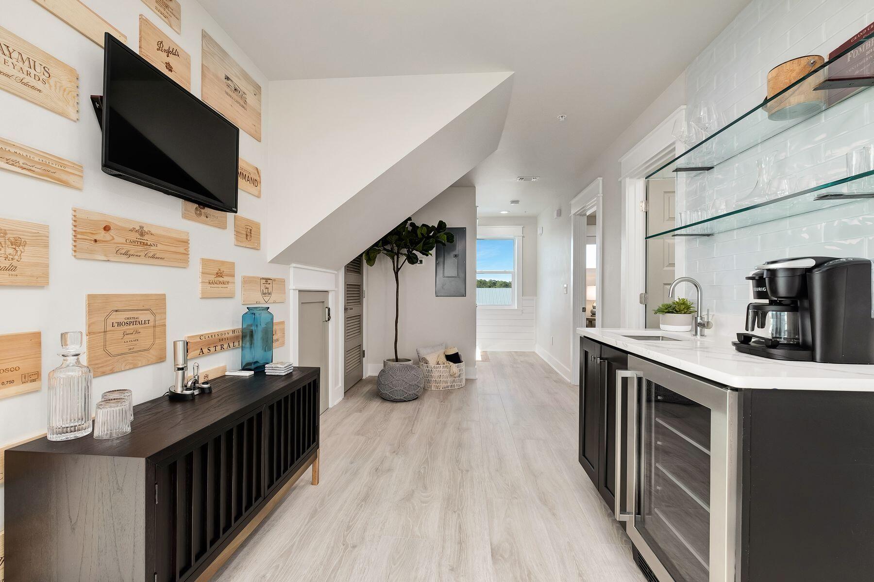76 Hotz Avenue Santa Rosa Beach, FL 32459 - Photo 30 of 70 a kitchen with kitchen island granite countertop a sink appliances cabinets and furniture